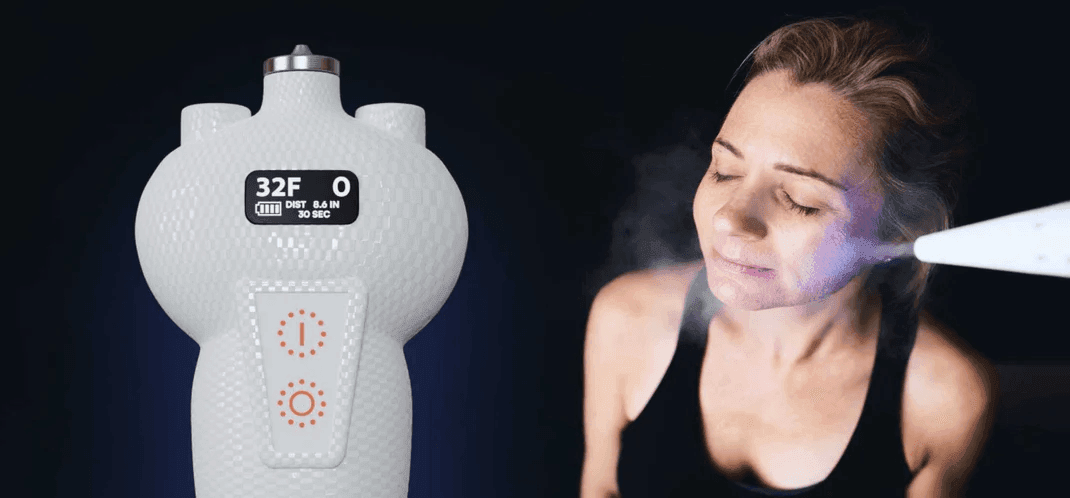 Advanced handheld device displaying temperature and distance readings, used for facial treatment, emitting vapor or mist.